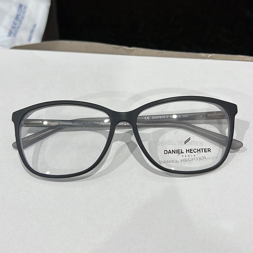 Brand new Authentic Daniel Hechter Eyeglasses Case & Wipe included